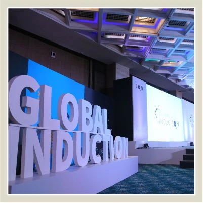 Corporate stage set fabrication and wooden backdrop production executed by event planners in Delhi Gurgaon Noida NCR