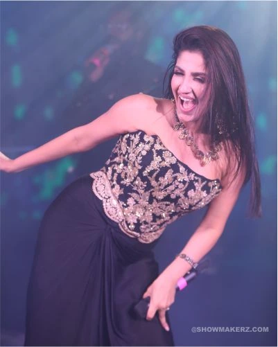 Female singer performing at corporate annual day