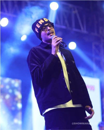 Punjabi singer performing live at corporate event