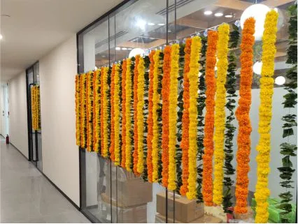 Creative ethnic props and floral marigold hanging options for offices