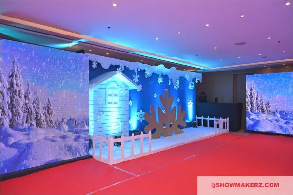 Intricate Winter Wonderland theme decoration and white scenic installations for corporate annual day events